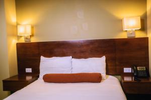 Postel nebo postele na pokoji v ubytování Hotel Posada del Virrey