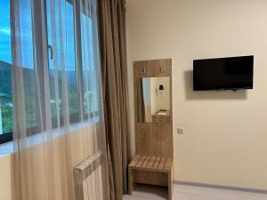 Hotel X的电视和/或娱乐中心