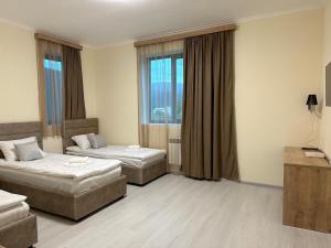 Hotel X客房内的一张或多张床位