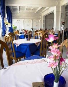 Restoran või mõni muu söögikoht majutusasutuses Parthenon