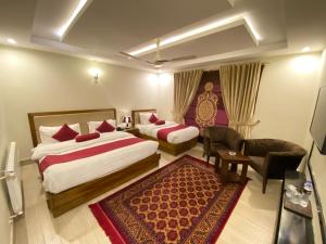 Maria Hotel and Resorts客房内的一张或多张床位