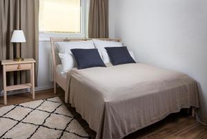Ένα ή περισσότερα κρεβάτια σε δωμάτιο στο Stylish apartment under the Tatras