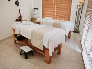 Katil atau katil-katil dalam bilik di Memora Hotel & Villas Chapala