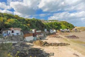 a group of houses on the shore of a beach at Maison, appartement type Triplex atypique de charme à 5 minutes du port et des plages in Saint-Brieuc