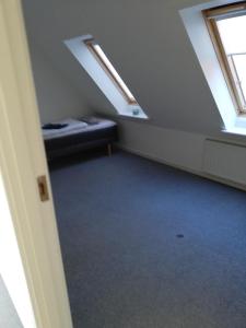 Vuode tai vuoteita majoituspaikassa Skovhusets B&B i Gislev