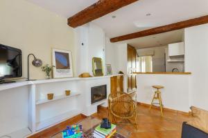 Μια τηλεόραση ή/και κέντρο ψυχαγωγίας στο Appartement Tonnel - Welkeys