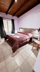 Katil atau katil-katil dalam bilik di Hotel Wiñak - Restaurant