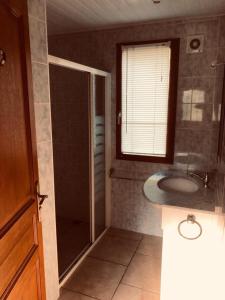 a bathroom with a shower and a sink at Gîte, Sexey-Aux-Forges, 8 personnes, 180m², 4 chambres 