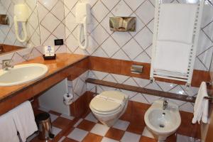 Koupelna v ubytování Hotel Grillo