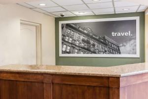 a large picture of a building on a wall at Hampton Inn Meridian in Meridian