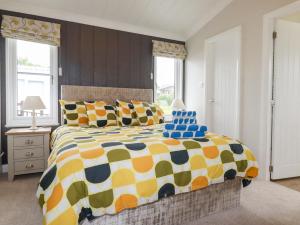 Postel nebo postele na pokoji v ubytování Mordros Lodge