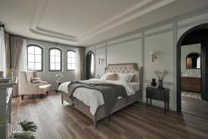 Postel nebo postele na pokoji v ubytování Davilla Đà Lạt Villa Collection
