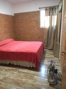 En eller flere senge i et værelse på LA MATERA.