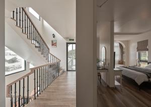 Postel nebo postele na pokoji v ubytování Davilla Đà Lạt Villa Collection