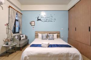 Ein Bett oder Betten in einem Zimmer der Unterkunft Wanghong Homestay
