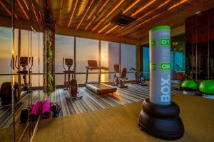 a room with a gym with a large machine in it at The Riviera Jomtien one bedroom in Jomtien Beach