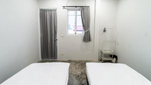 PIER 808 Hostel客房内的一张或多张床位