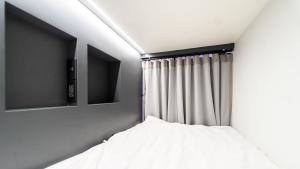 PIER 808 Hostel客房内的一张或多张床位