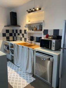 A kitchen or kitchenette at Villa Marie Cap Corse sentier douaniers