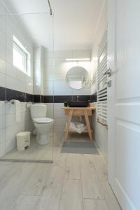 Ванная комната в Casa Pădurarului