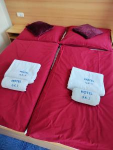 Voodi või voodid majutusasutuse Hotel O.K. 1 toas