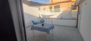 Balkón nebo terasa v ubytování Donna Beatrice aMare beach house