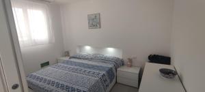 Postel nebo postele na pokoji v ubytování Donna Beatrice aMare beach house
