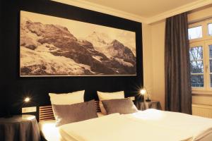 Postel nebo postele na pokoji v ubytování Rein Klassik Hotel