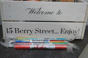 a box with the words welcome to berry street at 3 Bedroom Cottage in Conwy with Parking Sleeps 4 in Conwy +15 photos
