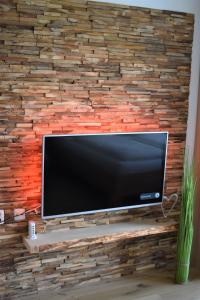 TV a/nebo společenská místnost v ubytování Apartment d ´Freizeit