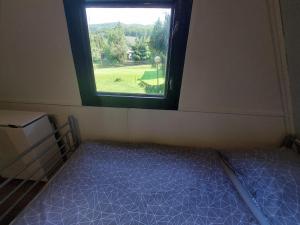 Posteľ alebo postele v izbe v ubytovaní Mátrai Vándor Apartmanok