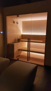 A bed or beds in a room at ORIZZONTI Vigneti Repetto