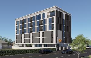 an artist rendering of the office building planned at the corner of the street at Goodday Hotel in Ban Nong Waeng