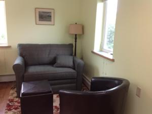 A seating area at A Suite Alaskan Inn