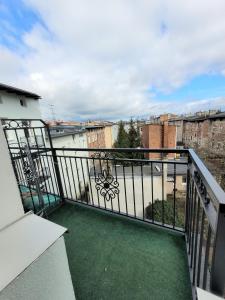 a balcony with a view of a city at apartament w centrum miasta in Bydgoszcz