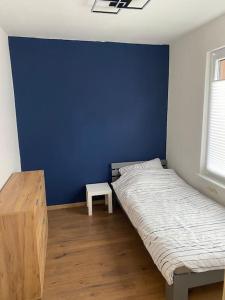 Ένα ή περισσότερα κρεβάτια σε δωμάτιο στο Koog Rooms
