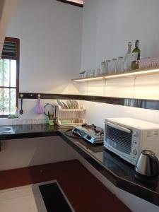 Køkken eller tekøkken på Gayan Villa