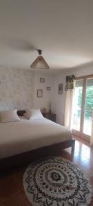 Postel nebo postele na pokoji v ubytování Chambre d'hôte Amouratcha