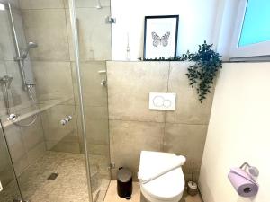 Bagno di homy City Lodge in Feldkirch, Grenznähe und doch Zentral