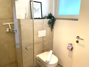 Bagno di homy City Lodge in Feldkirch, Grenznähe und doch Zentral