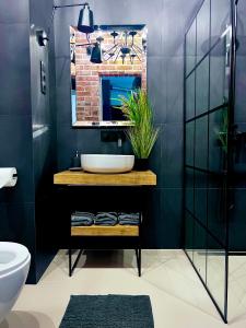 Kúpeľňa v ubytovaní Loft Apartment Browary Warszawskie