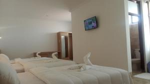 Postel nebo postele na pokoji v ubytování Guest House Simalem