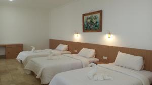 Postel nebo postele na pokoji v ubytování Guest House Simalem