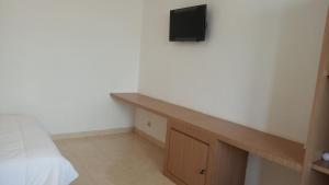 TV a/nebo společenská místnost v ubytování Guest House Simalem