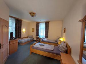Krevet ili kreveti u jedinici u okviru objekta 3 Raben - Leoben - Zimmer für Geschäftsreisende, Urlauber, Monteure und Handwerker, Polski Pensjonat Austria