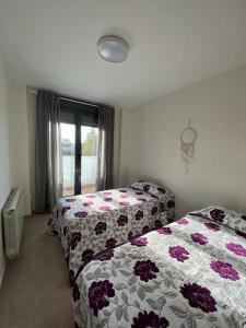 Postel nebo postele na pokoji v ubytování Apartamento Moderno + 21 fotografií
