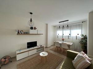 TV a/nebo společenská místnost v ubytování Apartamento Moderno