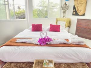 Postel nebo postele na pokoji v ubytování Wan D Villa Pattaya + 37 fotografií