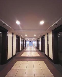 an empty hallway in a building with a hallwayngth at Casa Concha by Celandine in Manila