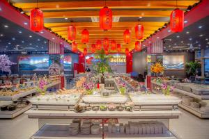 a store filled with lots of tables and red lanterns at Bình An Nhiên hotel in Ninh Binh +170 photos